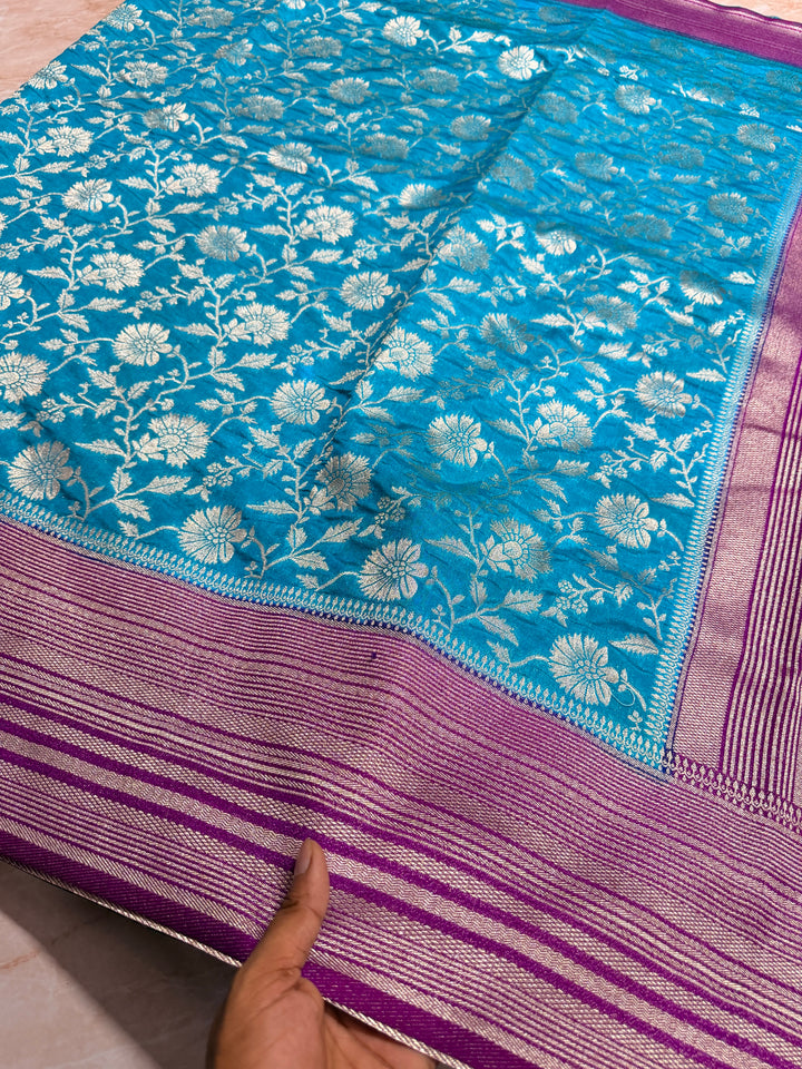 PAPER SILK WITH FLORAL JAAL DESIGN IN SKY BLUE COLOUR SHADE