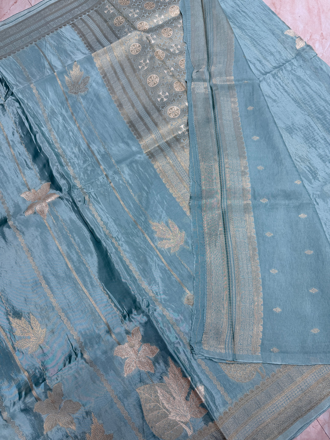 KOREAN SILK IN LIGHT MATALLIC AQUA BLUE WITH GOLD AND SILVER ZARI WORK
