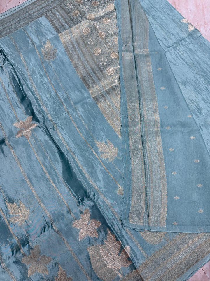 KOREAN SILK IN LIGHT MATALLIC AQUA BLUE WITH GOLD AND SILVER ZARI WORK
