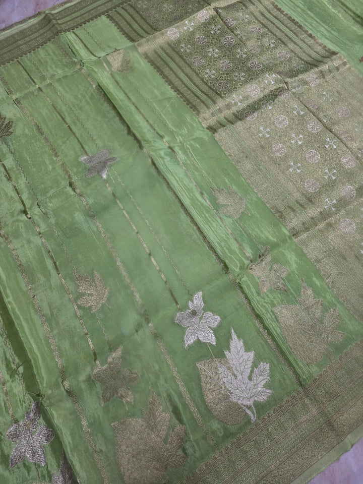 KOREAN SILK IN PISTA GREEN  WITH GOLD AND SILVER ZARI WORK