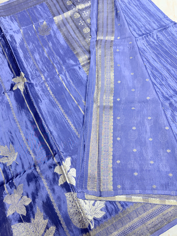 KOREAN SILK IN MATALLIC LIGHT LEVENDER WITH GOLD AND SILVER ZARI WORK