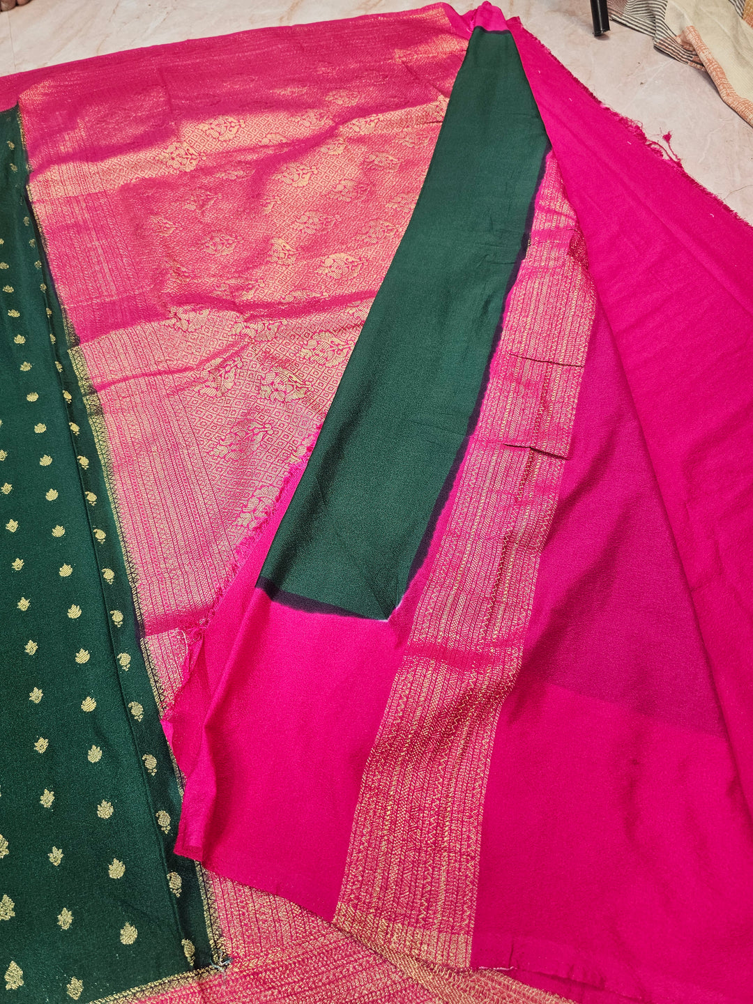 KHADDI GEORGETTE IN BOTTLE GREEN WITH RANI BORDER