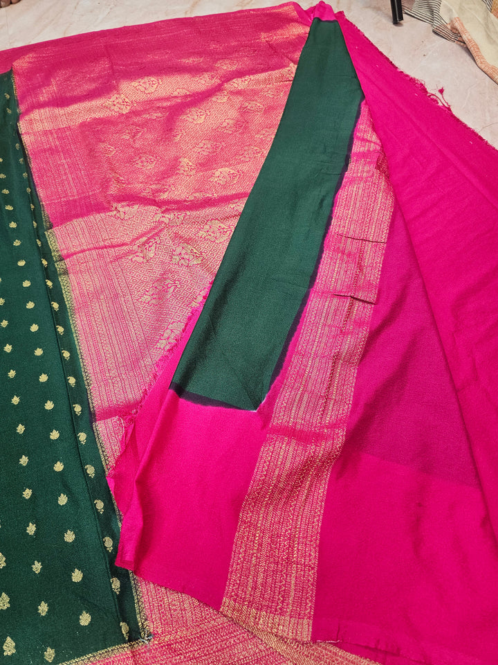 KHADDI GEORGETTE IN BOTTLE GREEN WITH RANI BORDER