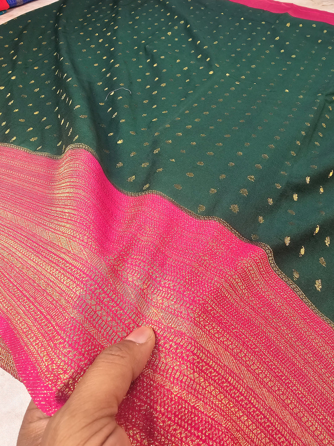 KHADDI GEORGETTE IN BOTTLE GREEN WITH RANI BORDER