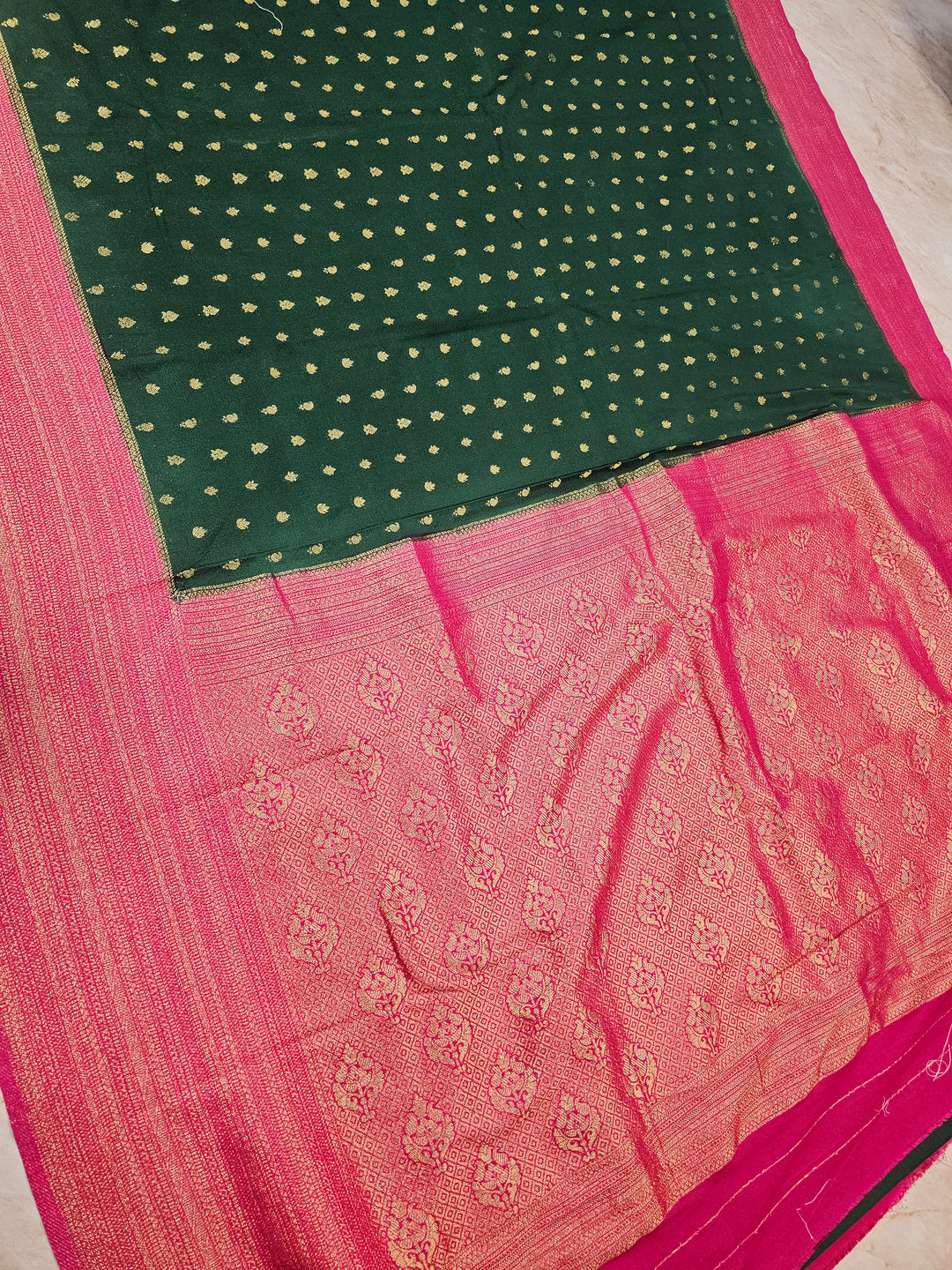 KHADDI GEORGETTE IN BOTTLE GREEN WITH RANI BORDER