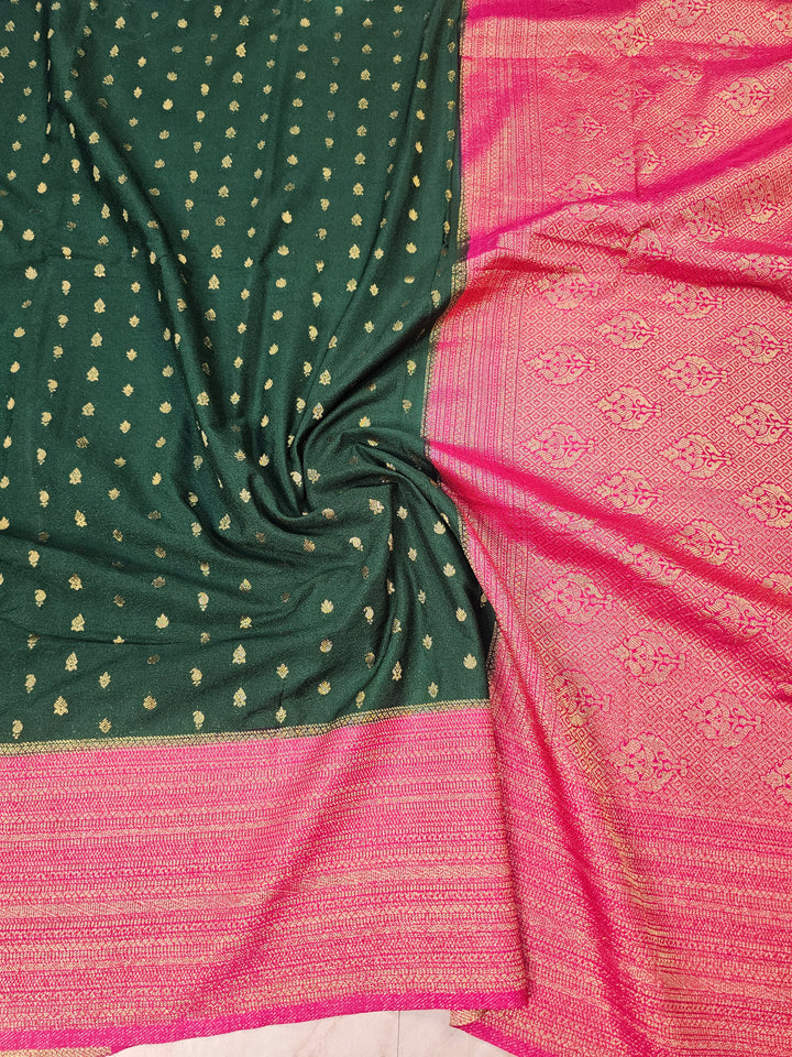 KHADDI GEORGETTE IN BOTTLE GREEN WITH RANI BORDER