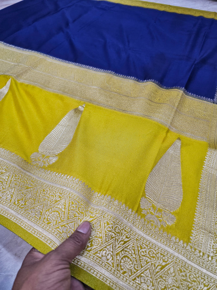 KHADDI GEORGETTE IN NAVY BLUE WITH GOLD BORDER
