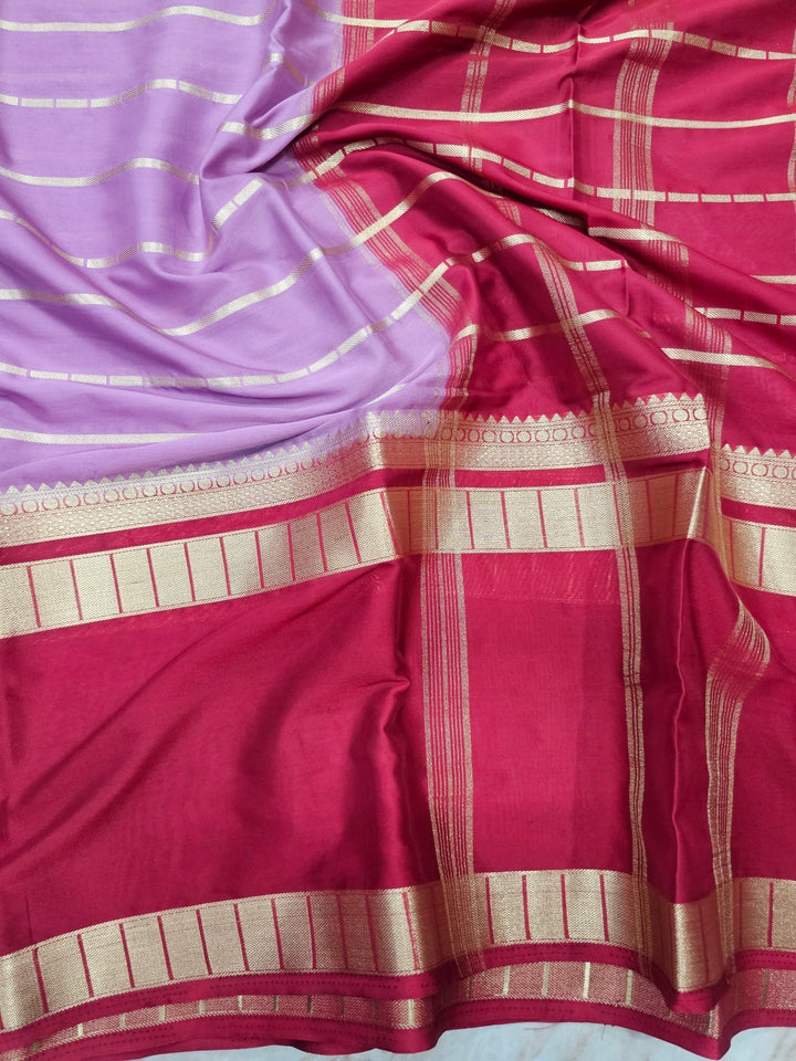 MYSORE CREPE IN LAVENDER WITH RED BORDER