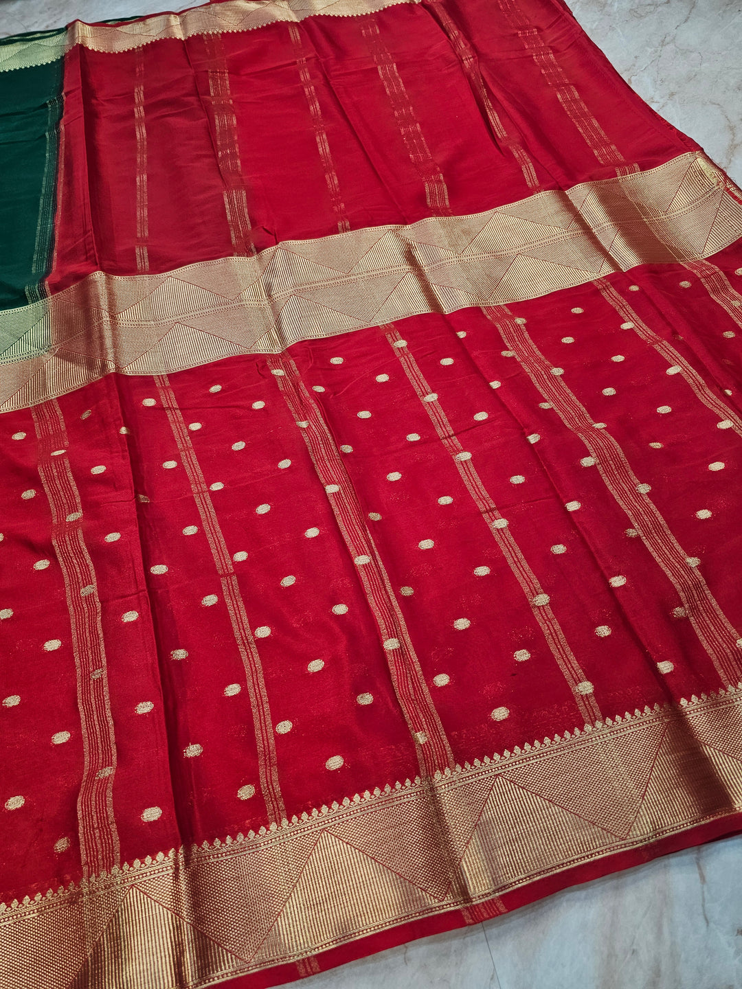 MYSORE CREPE IN BOTTLE GREEN WITH RED COLOUR