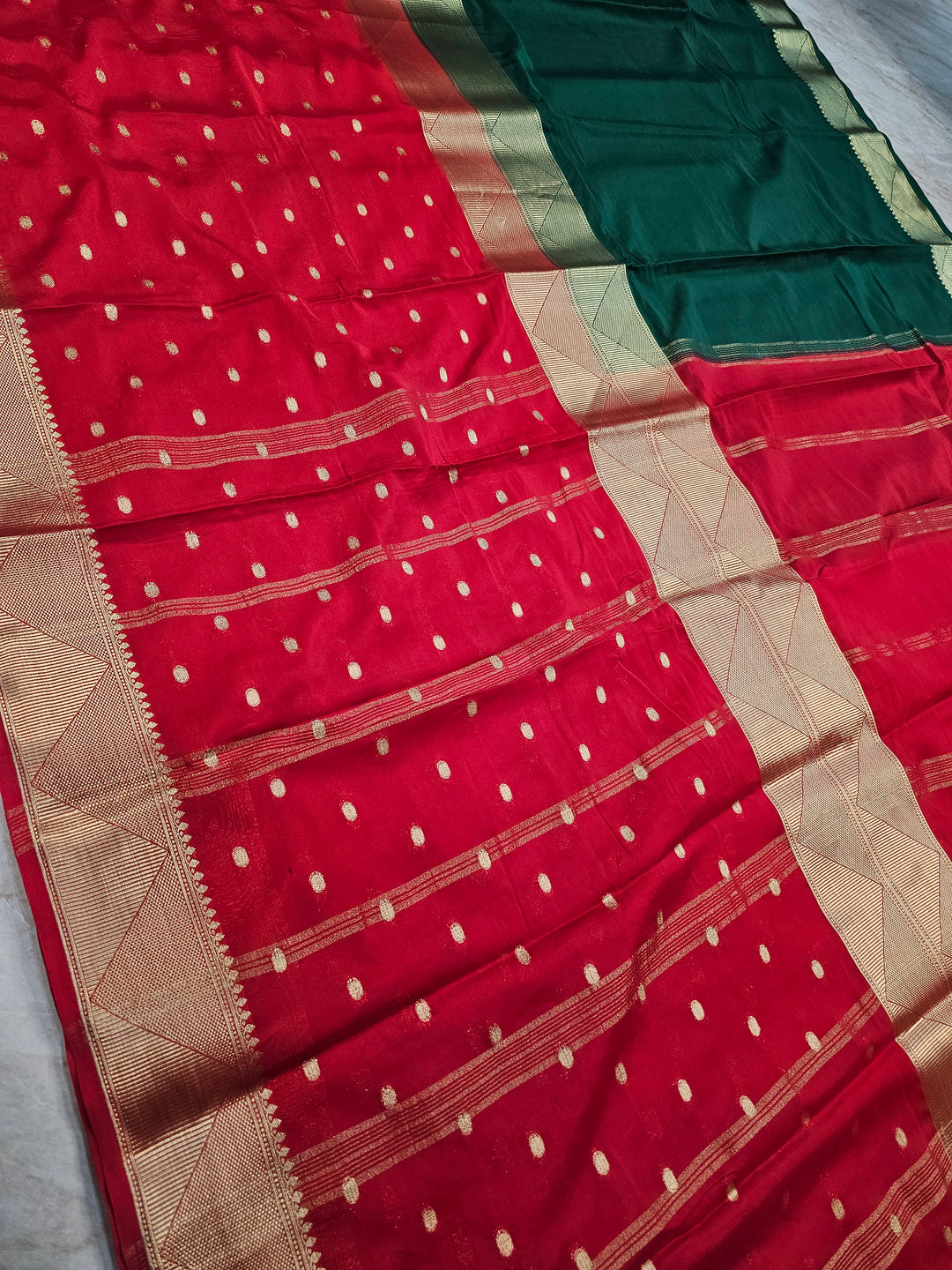 MYSORE CREPE IN BOTTLE GREEN WITH RED COLOUR