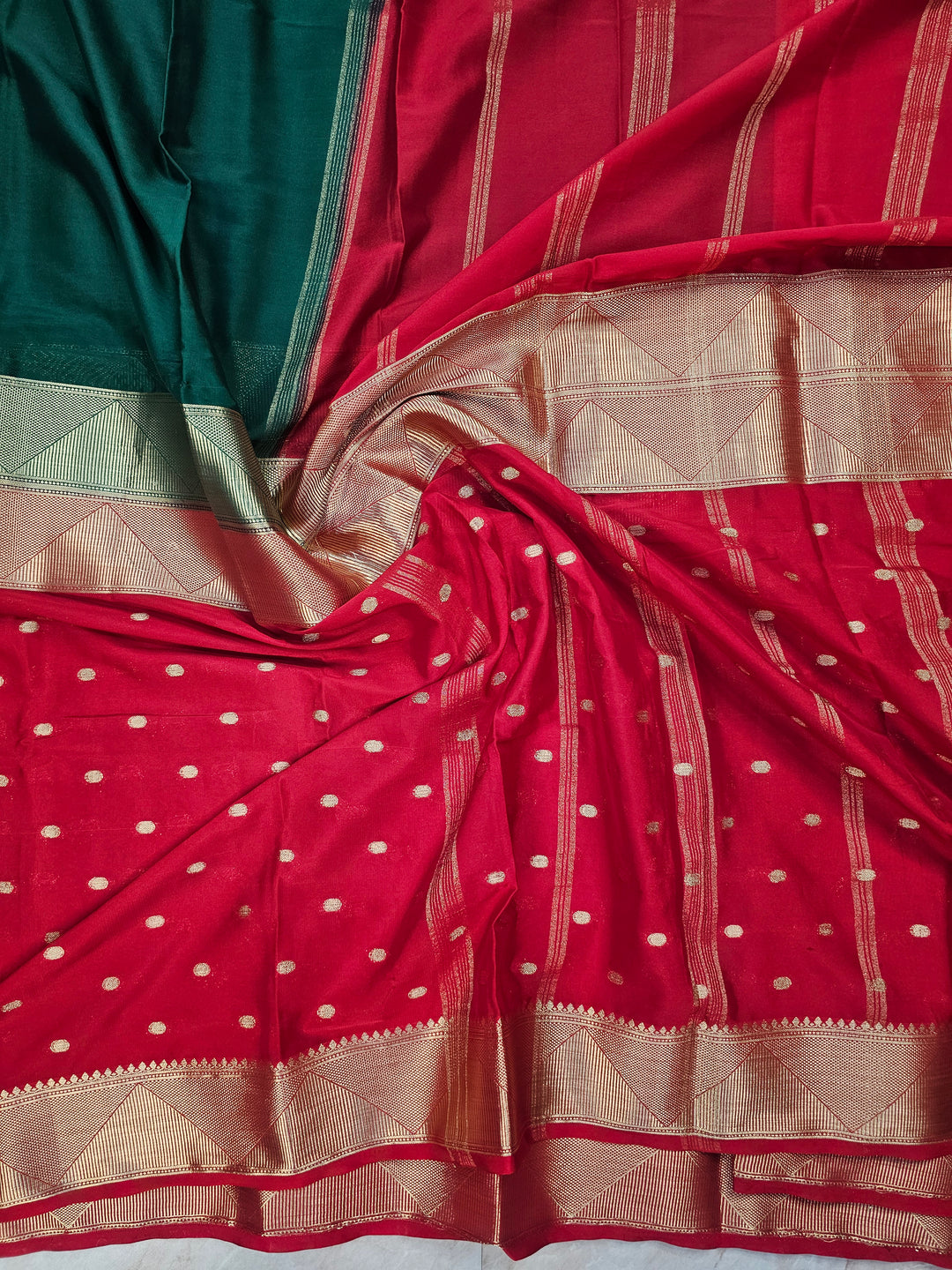 MYSORE CREPE IN BOTTLE GREEN WITH RED COLOUR