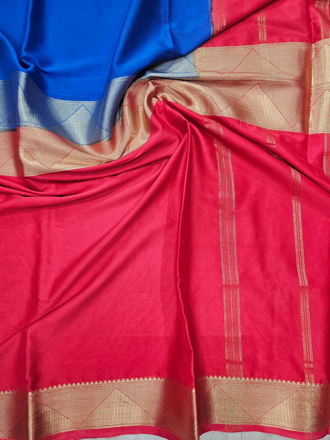 MYSORE CREPE IN ROYAL BLUE WITH RED BORDER