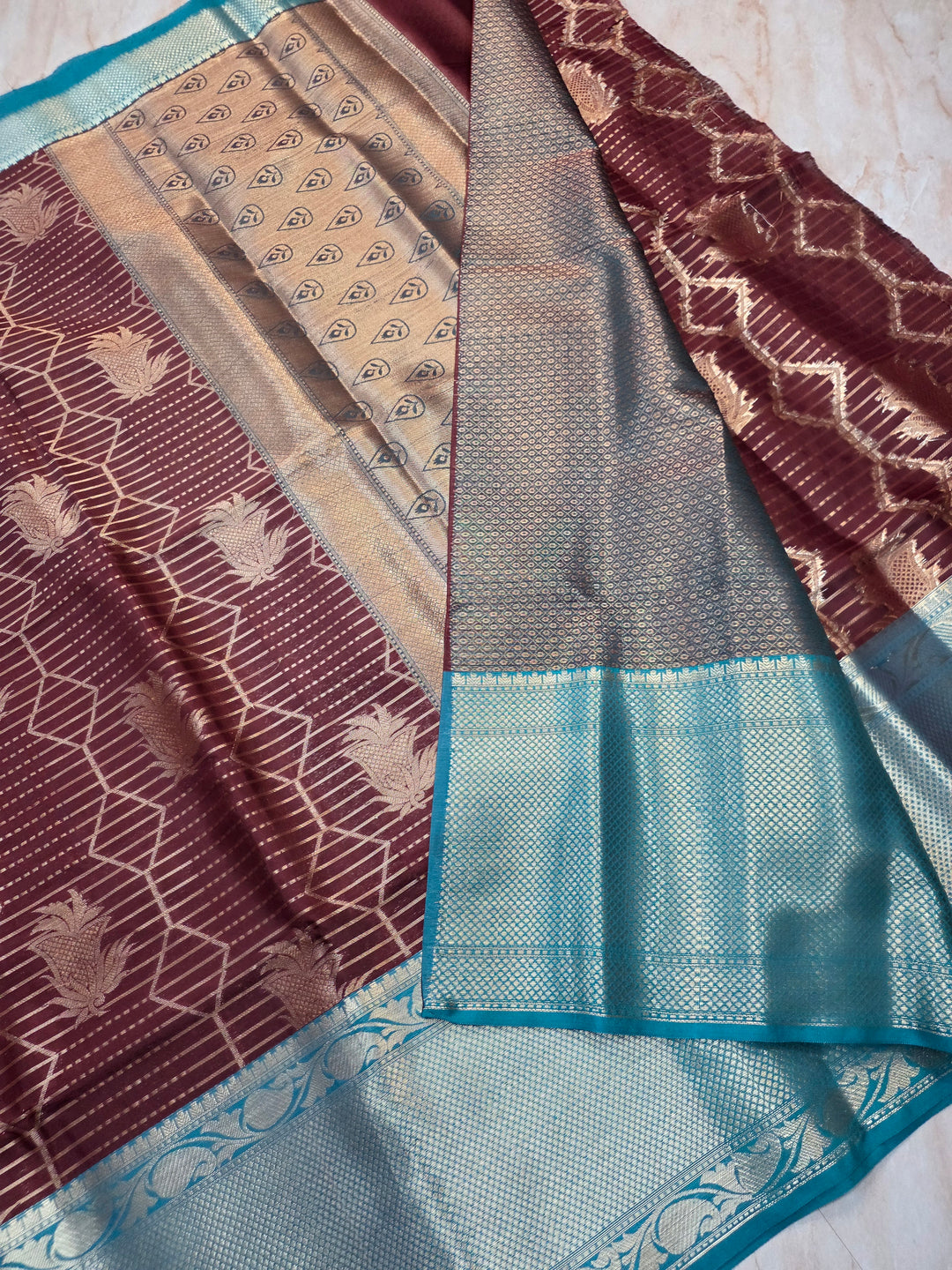 BANARASI SILK IN GARNET WITH SEE GREEN BORDER