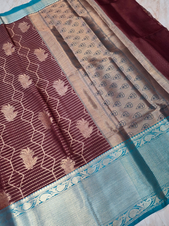 BANARASI SILK IN GARNET WITH SEE GREEN BORDER