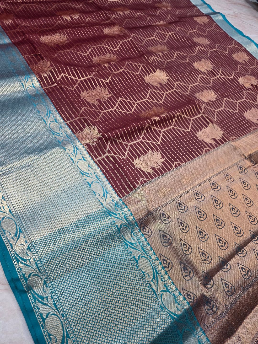 BANARASI SILK IN GARNET WITH SEE GREEN BORDER