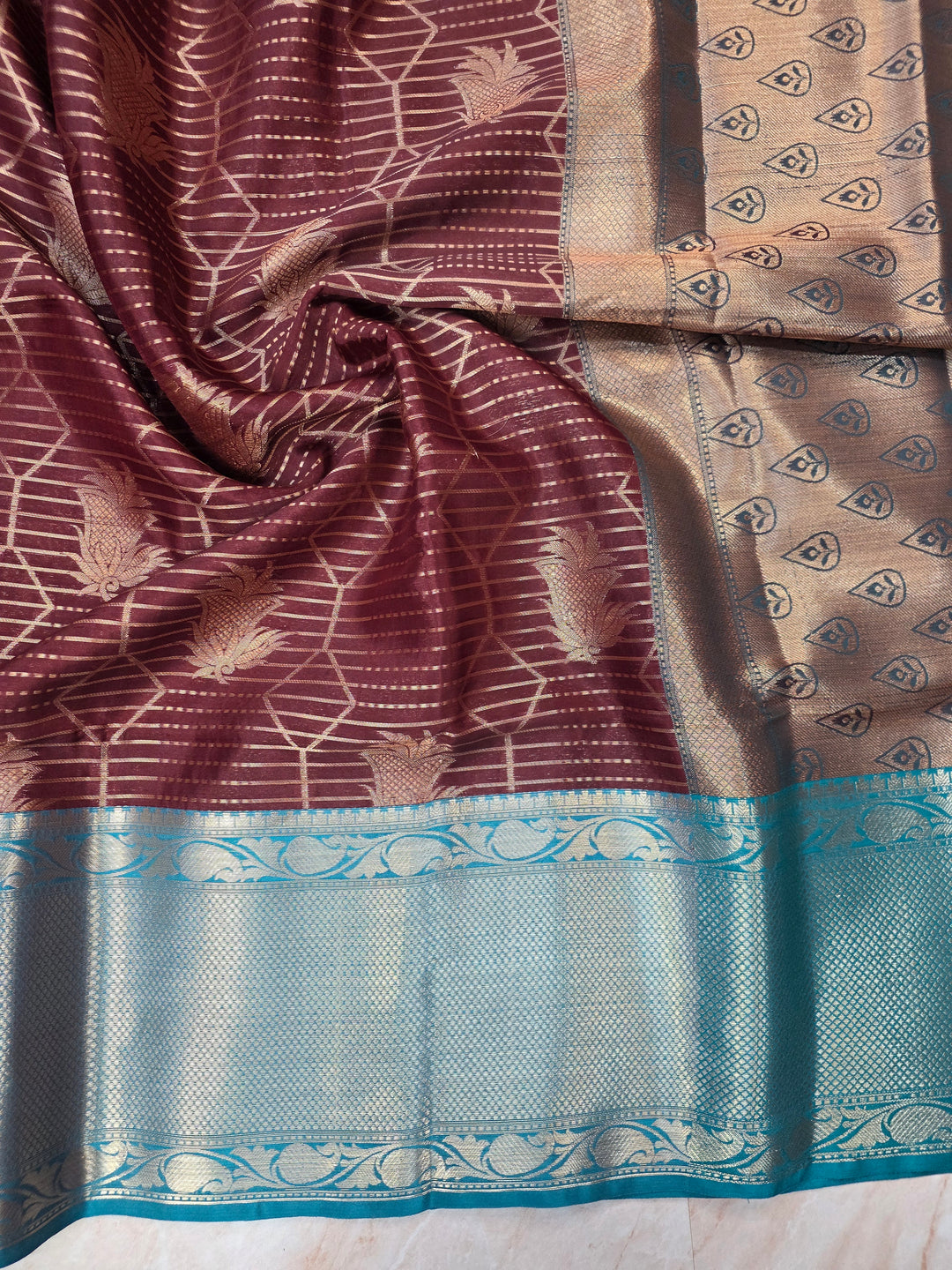 BANARASI SILK IN GARNET WITH SEE GREEN BORDER