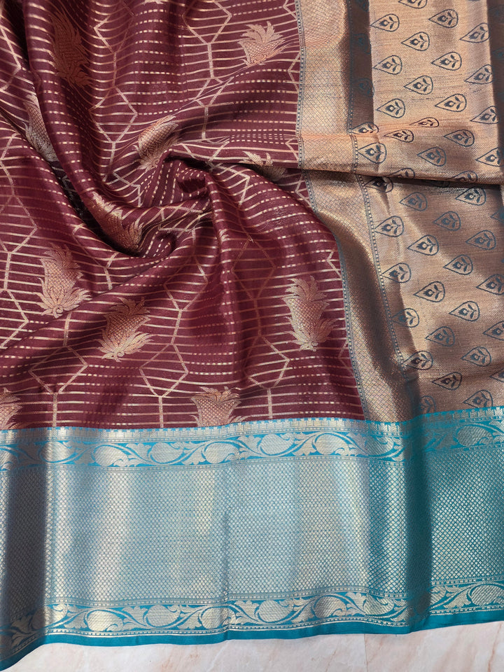 BANARASI SILK IN GARNET WITH SEE GREEN BORDER