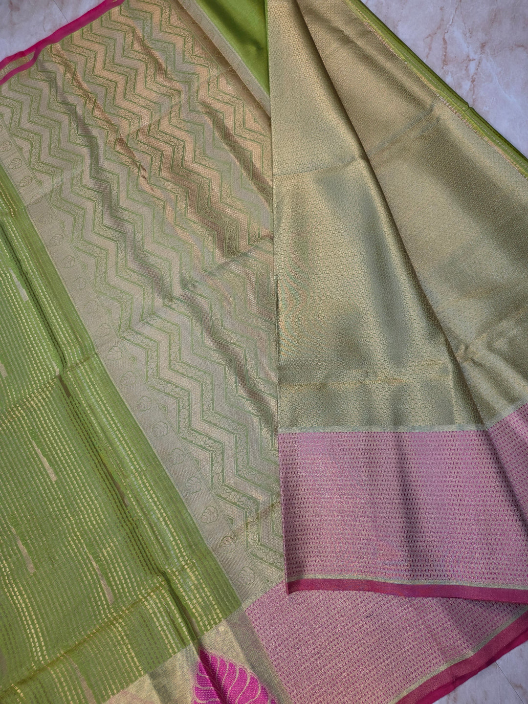 BANARASI SILK IN PARROT GREEN WITH TISU BORDER IN RANI COLOUR