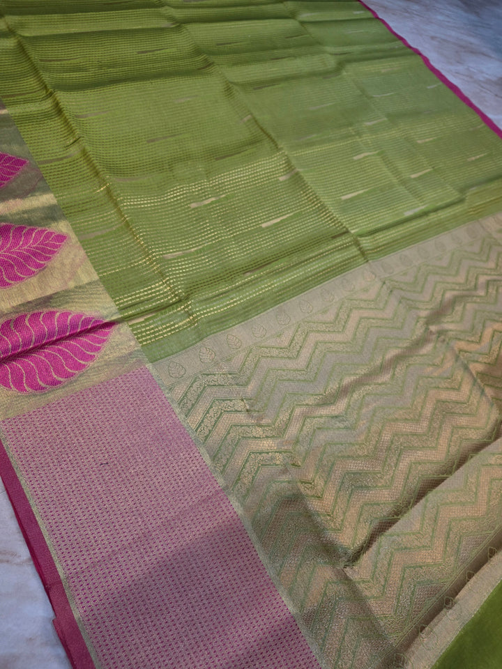 BANARASI SILK IN PARROT GREEN WITH TISU BORDER IN RANI COLOUR