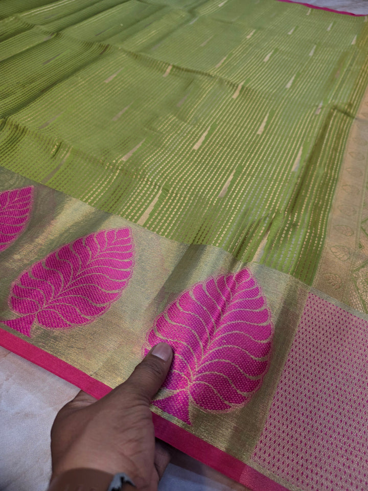BANARASI SILK IN PARROT GREEN WITH TISU BORDER IN RANI COLOUR