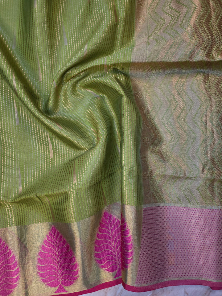 BANARASI SILK IN PARROT GREEN WITH TISU BORDER IN RANI COLOUR