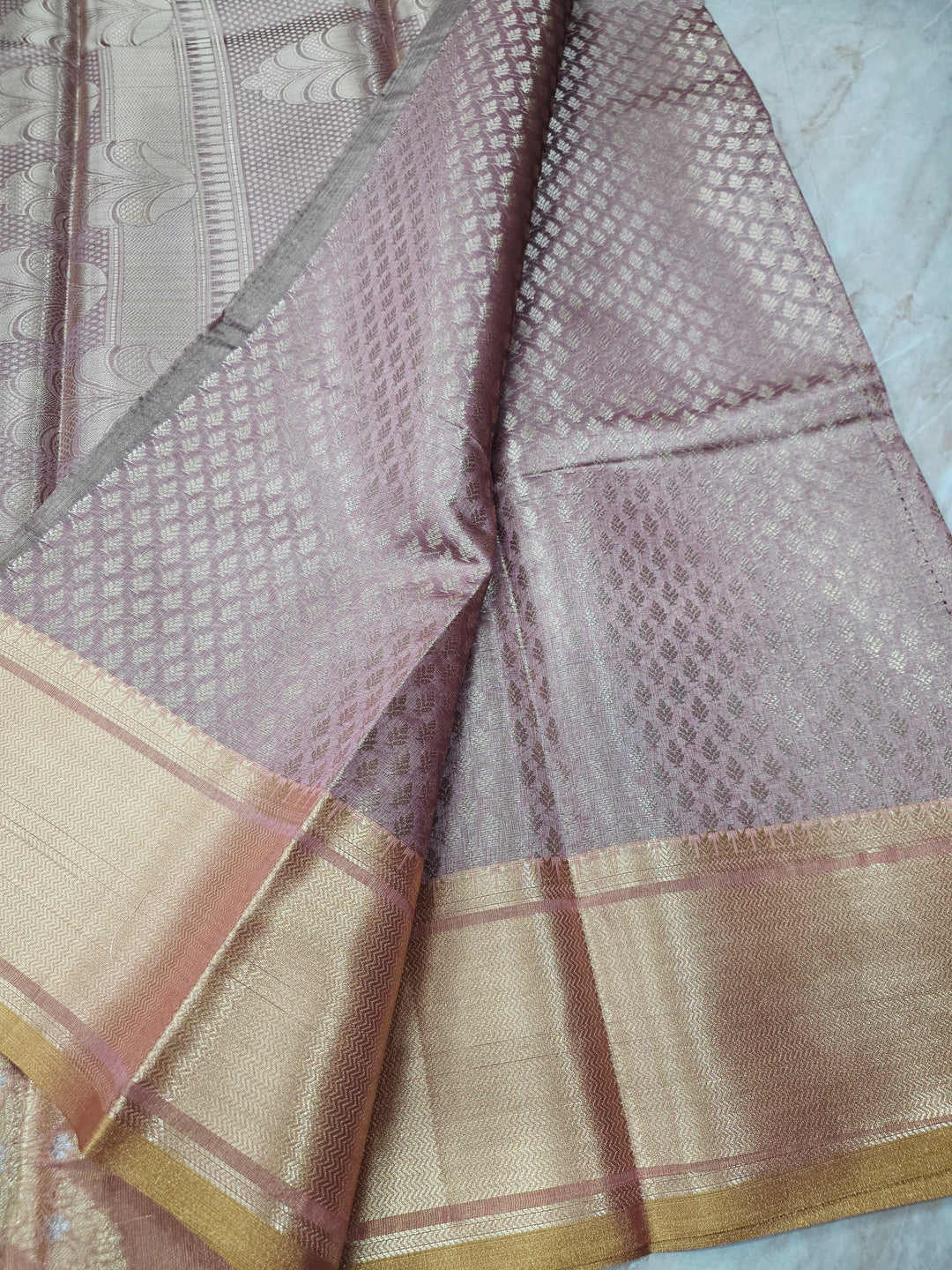 BANARASI SILK IN BROWN SHADE WITH GOLD ZARI WORK AND TISU BORDER