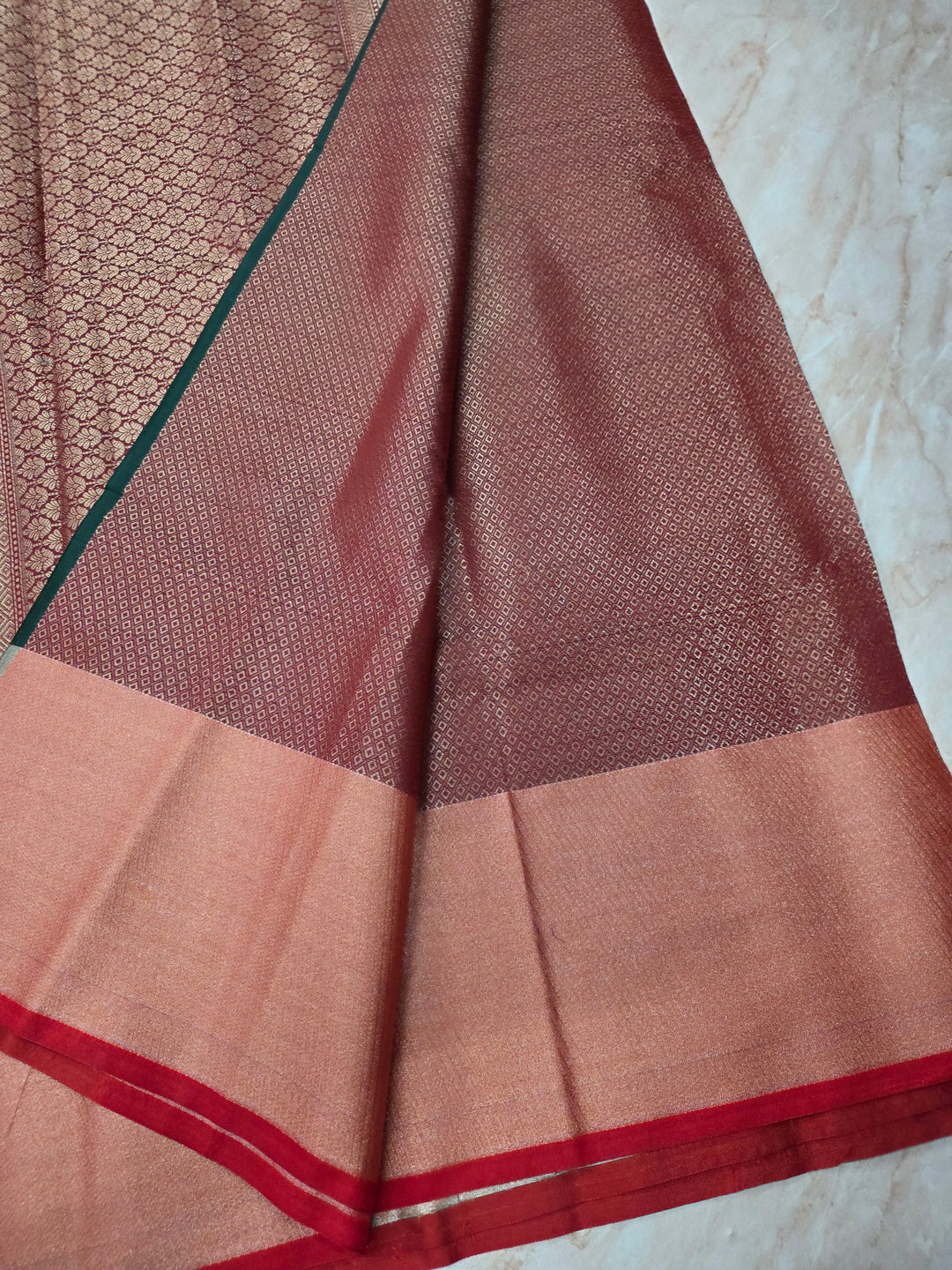 BANARASI SILK IN BOTTLE GREEN WITH TISU RED BORDER