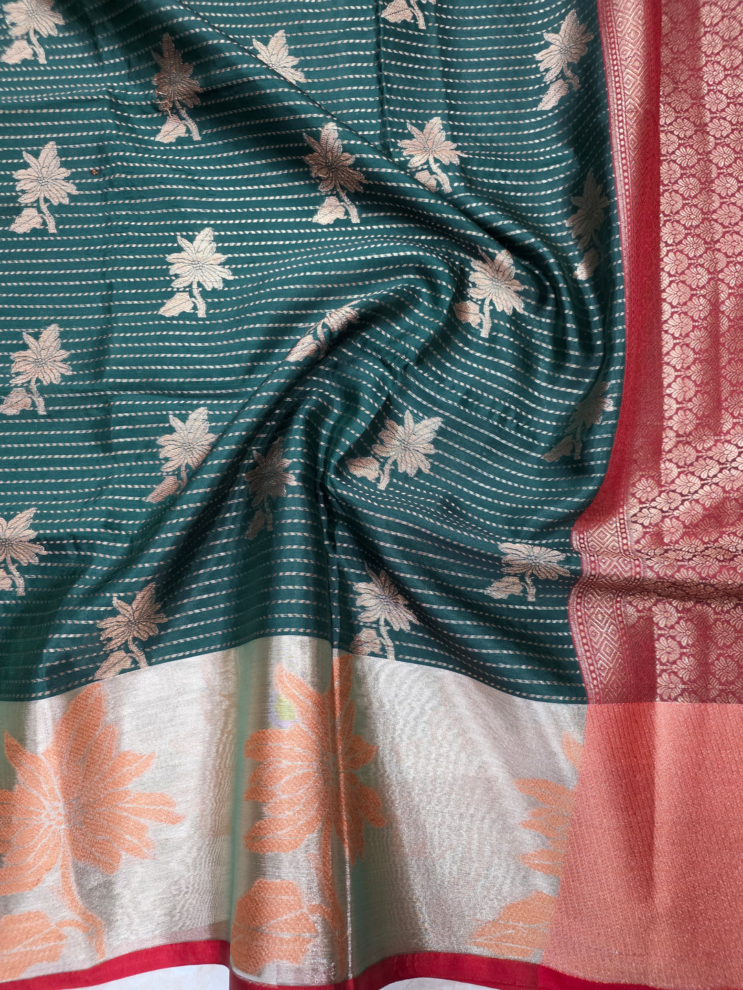 BANARASI SILK IN BOTTLE GREEN WITH TISU RED BORDER