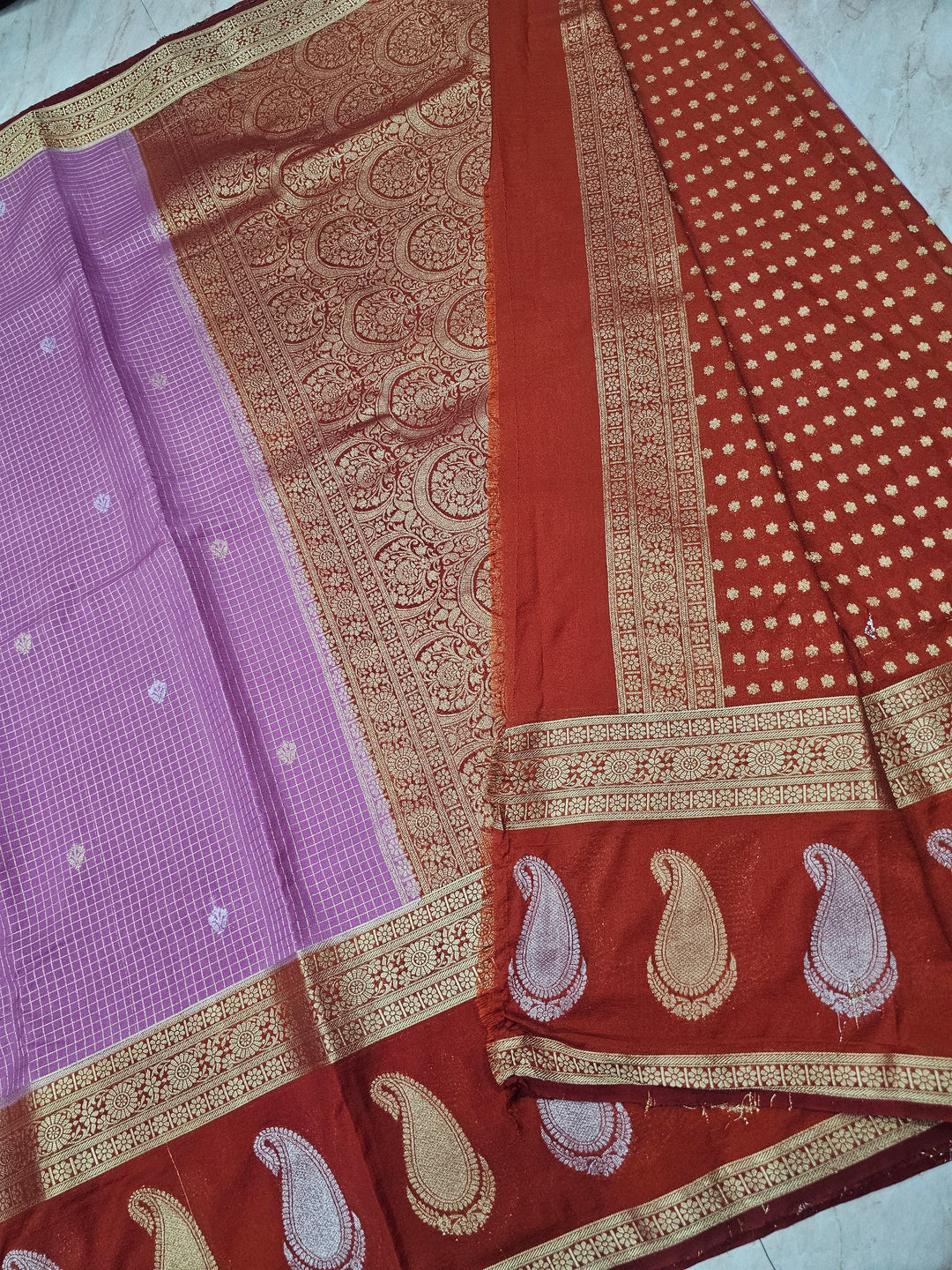 CREPE GEORGETTE IN LAVENDER WITH RED BORDER