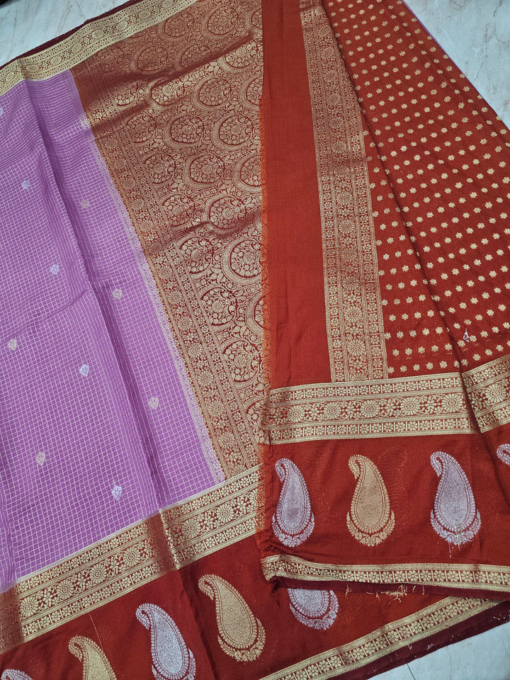 CREPE GEORGETTE IN LAVENDER WITH RED BORDER