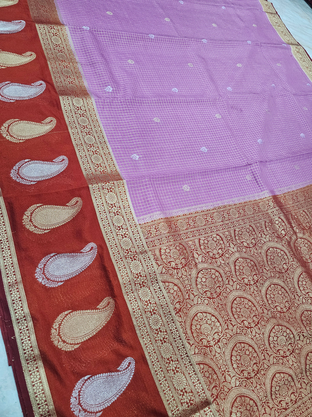 CREPE GEORGETTE IN LAVENDER WITH RED BORDER