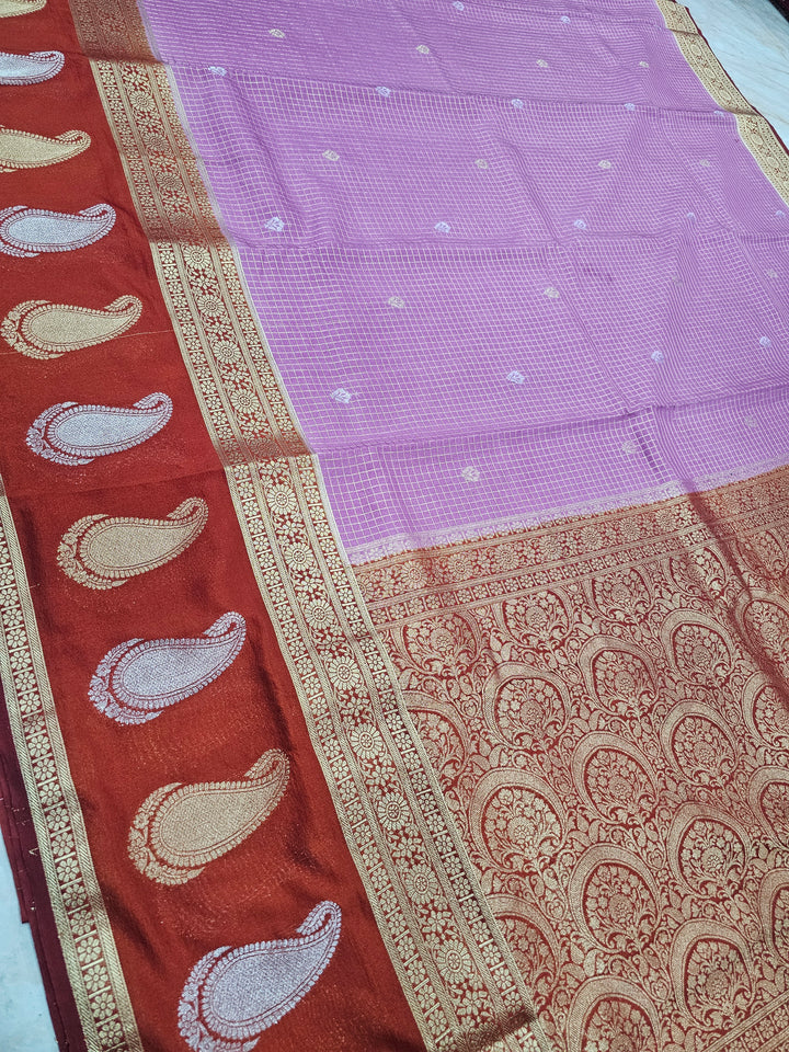 CREPE GEORGETTE IN LAVENDER WITH RED BORDER