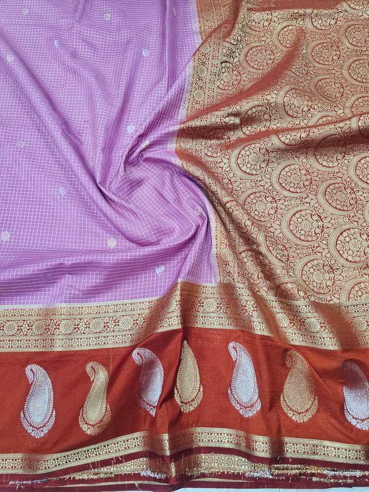 CREPE GEORGETTE IN LAVENDER WITH RED BORDER