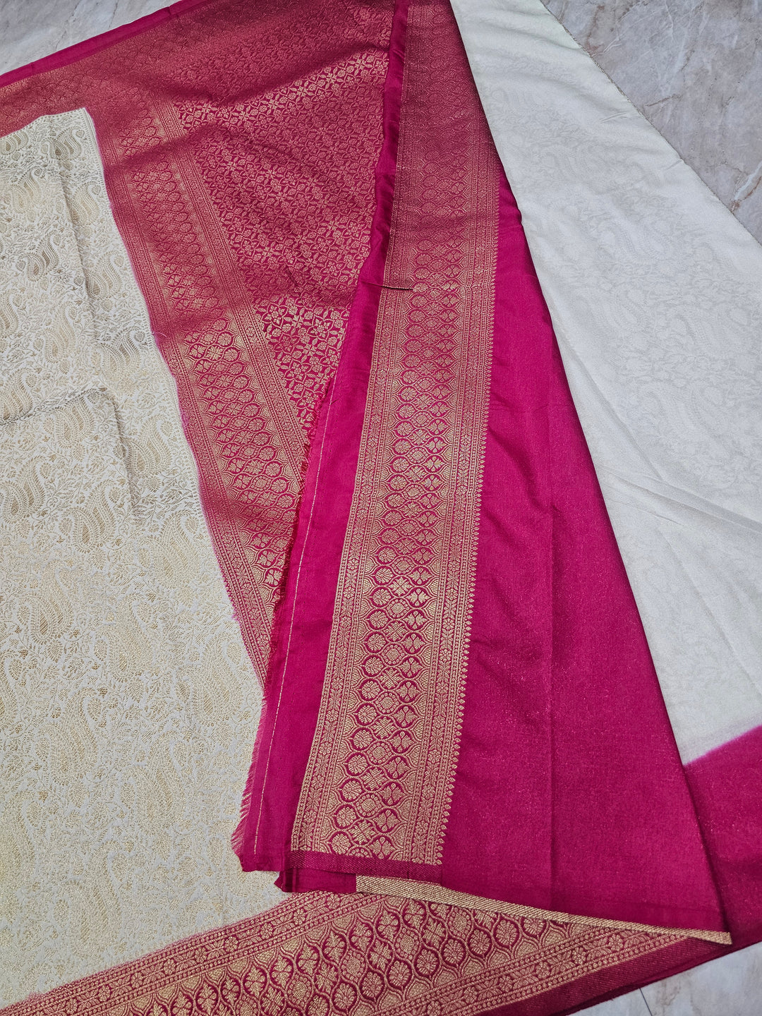 KHADDI GEORGETTE IN CREAM WITH RED BORDER