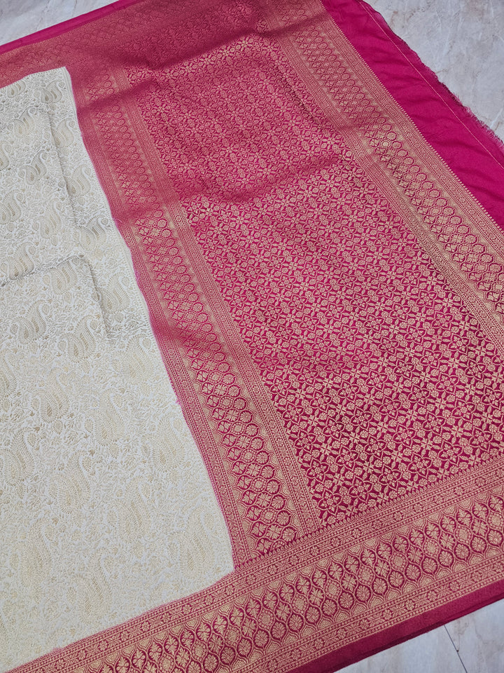 KHADDI GEORGETTE IN CREAM WITH RED BORDER
