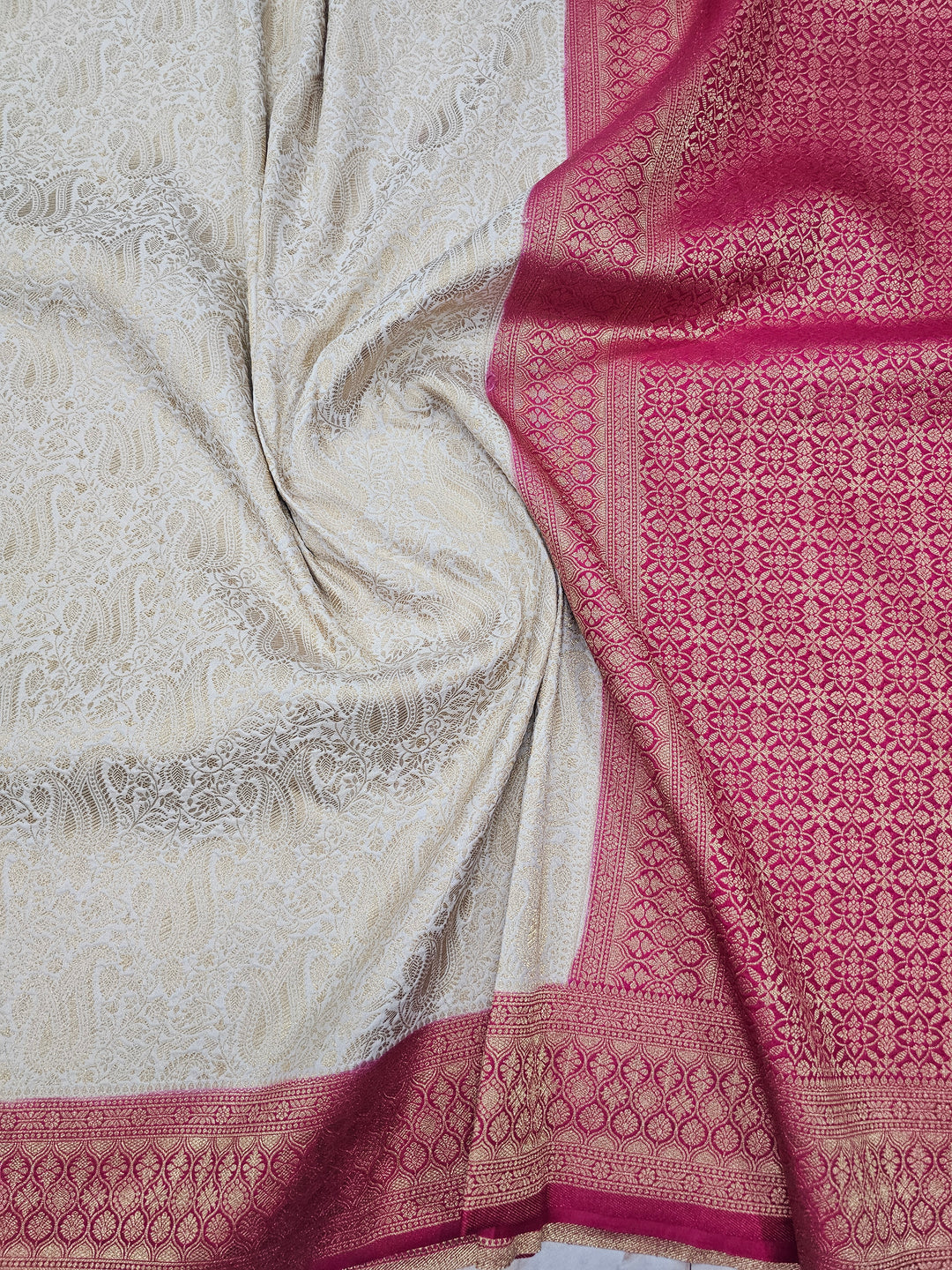 KHADDI GEORGETTE IN CREAM WITH RED BORDER
