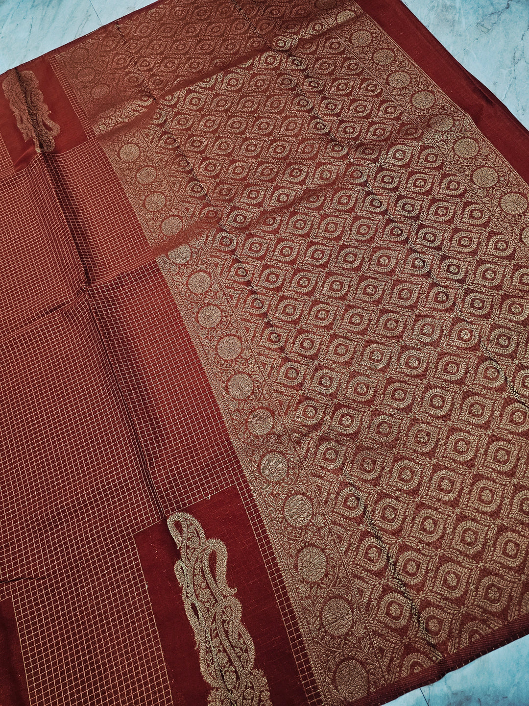 CREPE GEORGETTE IN GOLDEN EMBER WITH GOLD ZARI AND CHECKS