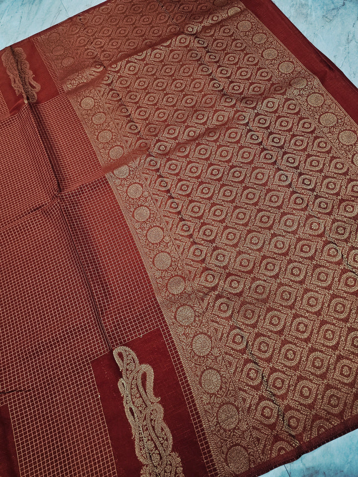 CREPE GEORGETTE IN GOLDEN EMBER WITH GOLD ZARI AND CHECKS