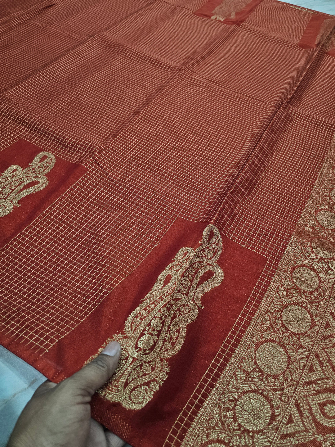 CREPE GEORGETTE IN GOLDEN EMBER WITH GOLD ZARI AND CHECKS