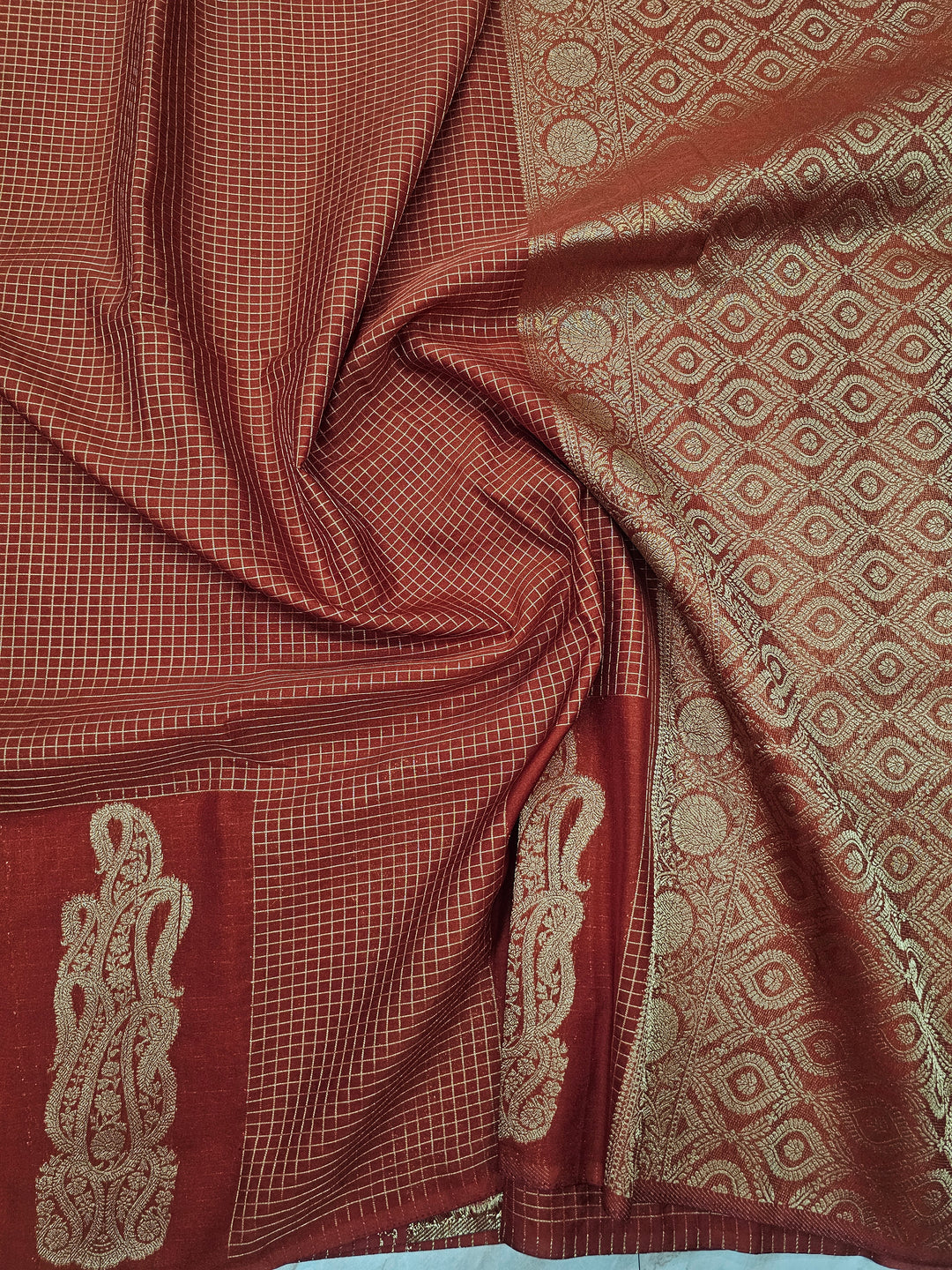 CREPE GEORGETTE IN GOLDEN EMBER WITH GOLD ZARI AND CHECKS