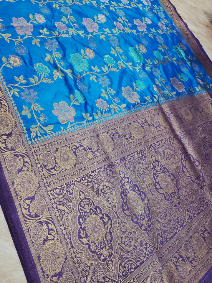 RUSSIAN SILK IN FEROZI BLUE WITH ROYAL BLUE BORDER