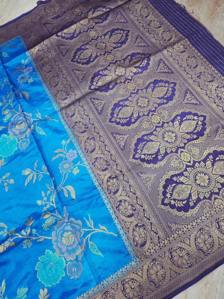 RUSSIAN SILK IN FEROZI BLUE WITH NAVY BLUE BORDER
