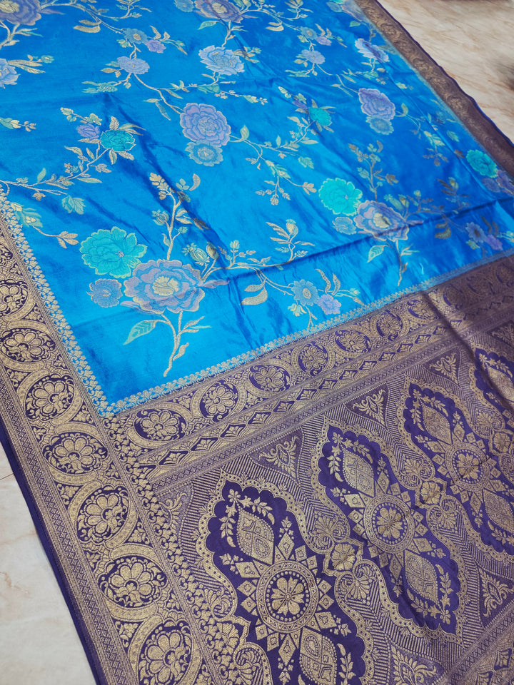 RUSSIAN SILK IN FEROZI BLUE WITH NAVY BLUE BORDER