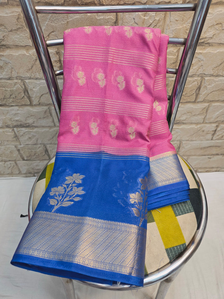 CREPE GEORGETTE IN BABY PINK WIYH ROYAL BLUE BORDER