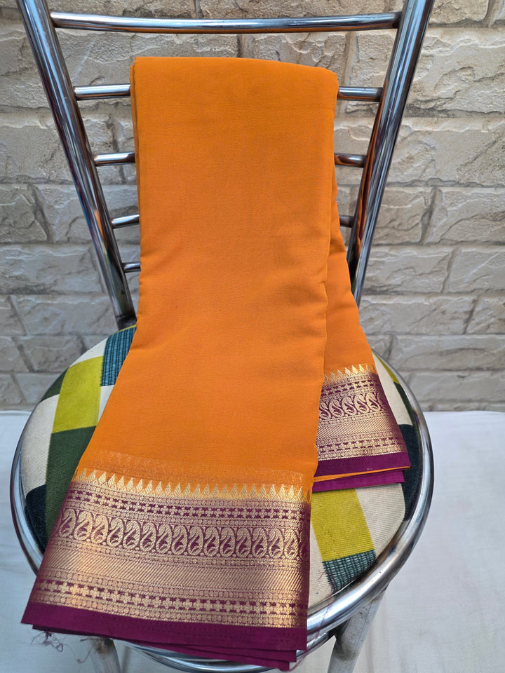 CREPE GEORGETTE IN MUSTARD ORANGE WITH  WINE BORDER