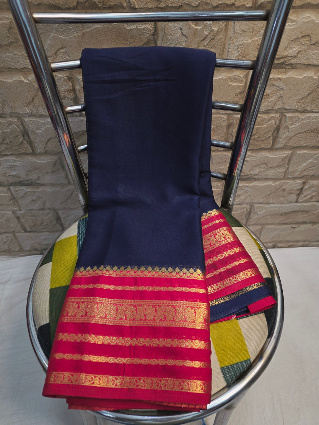 CREPE GEORGETTE IN NAVY BLUE WITH RED BORDER