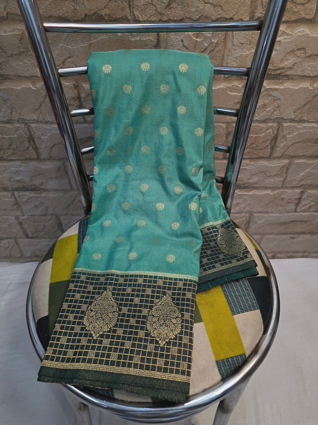 CREPE GEORGETTE IN SEA GREEN WITH  BOTTLE GREEN BORDER