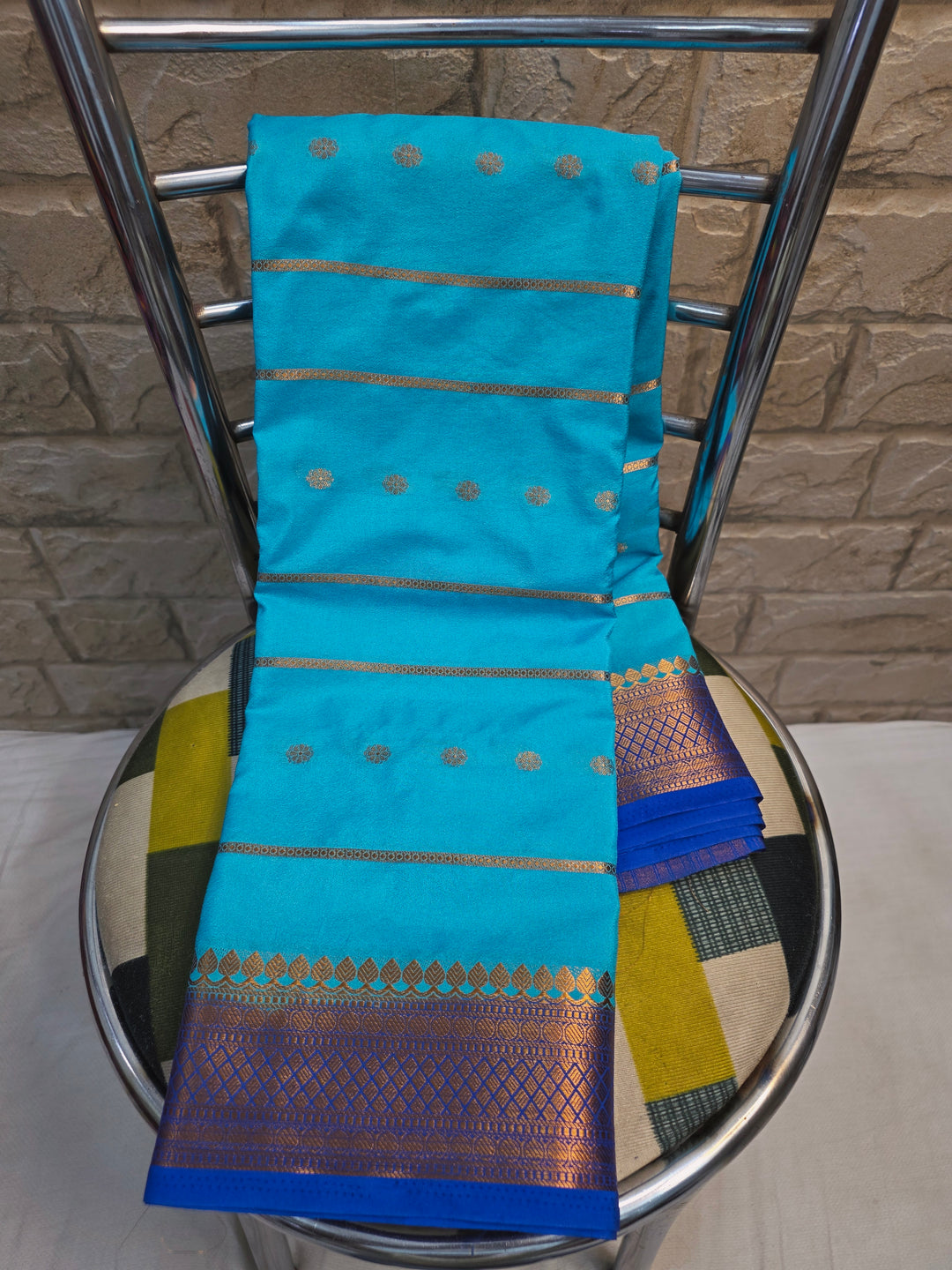 CREPE GEROGETTE IN CORAL BLUE WITH ROYAL BLUE BORDER