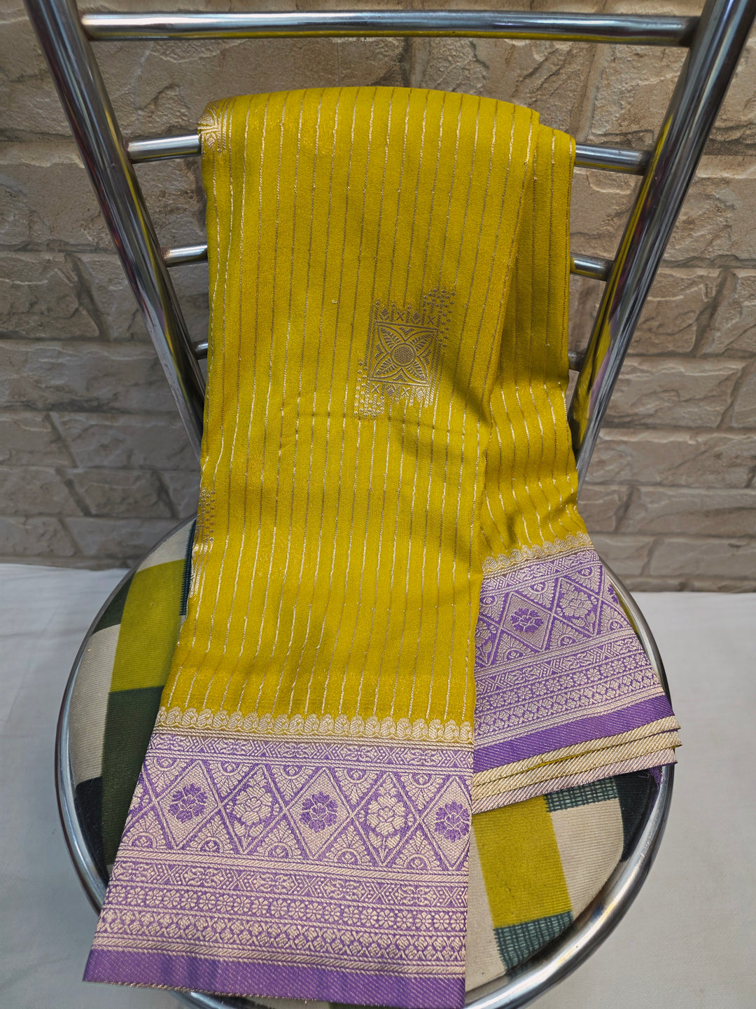 GEROGETTE IN GOLD WITH LAVENDER COLOUR BORDER