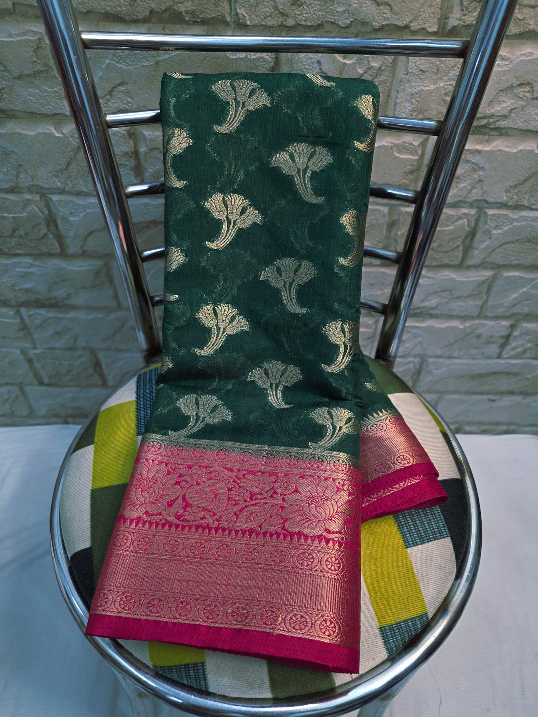 BANARASI SILK IN BOTTLE GREEN WITH RED BORDER